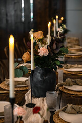 modern wedding table scape with farmhouse elements and black vases