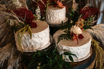 white wedding cake with floral display