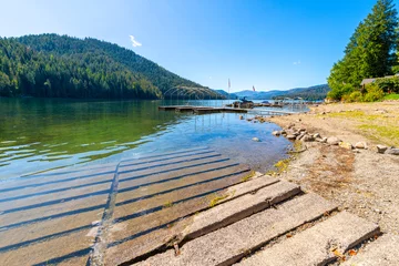 Fotobehang Boat launch ramps and docks at the small, rural Spirit Lake in the Northwest small town of Spirit Lake, Idaho, a suburb of the general Coeur d'Alene area of the North Idaho Panhandle. © Kirk Fisher