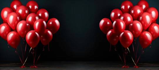 Poster Festive background with red balloons bunch on black Background  © Алина Бузунова