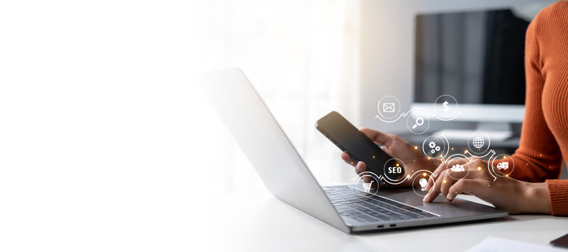 Woman using a computer for analysis SEO Search Engine Optimization Marketing Ranking Traffic Website Internet Business Technology Concept.