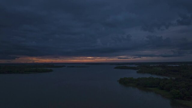 Cloudy blue and orange sunset drone Hyperlapse 