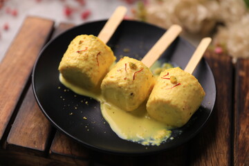 indian famous kulfi dessert closeup with selective focus and blur