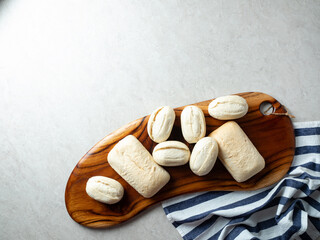 frozen dough bread on wooden plate