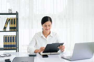 asian business woman working with paper document.