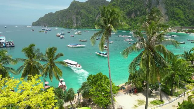 Koh Phi Phi Island (A Tourist Hotspot) In The Archipelagos Of Thailand. Aerial Establishing Shot Revealing A Picture Perfect Tropical Beach Paradise.