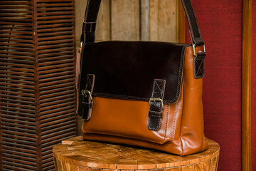 Display of handmade women's genuine leather bags made by craftsmen in Indonesia. Various types of very fashionable women's bags with nice details and various color and motif variants