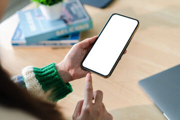 Human working on modern smartphone with blank white mobile screen for advertising, mockup, technology, advertising, search information, creative design, social media, online marketing, chat, phone
