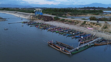 Fototapeta na wymiar Aerial view of boat docks along Limboto lake, Gorontalo province, Indonesia