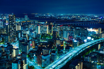 A night panoramic cityscape near Yodo river in Osaka wide shot