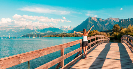 tourist woman of the alpine lake in Switzerland