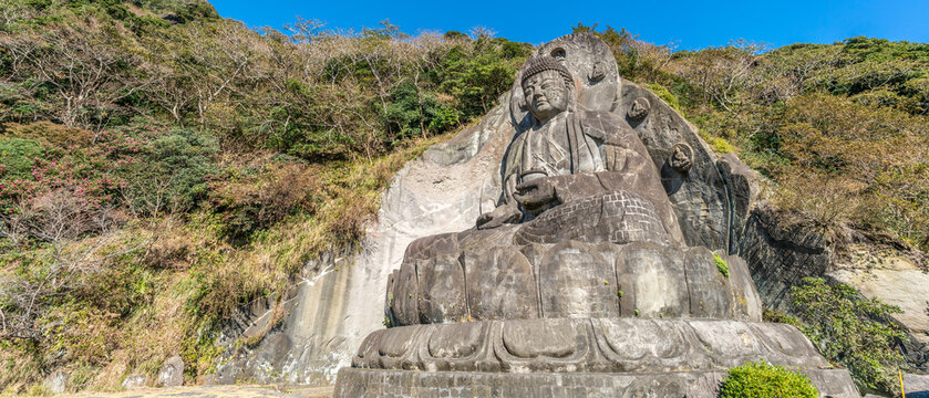 Mount Nokogiri (Nokogiriyama) Great Buddha (Nihon-ji daibutsu). Carving of seated sculpture of Yakushi Nyorai completed in 1783.  The largest pre-modern stone-carved Daibutsu in Japan