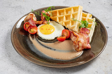 belgian waffle with egg and tomatoes