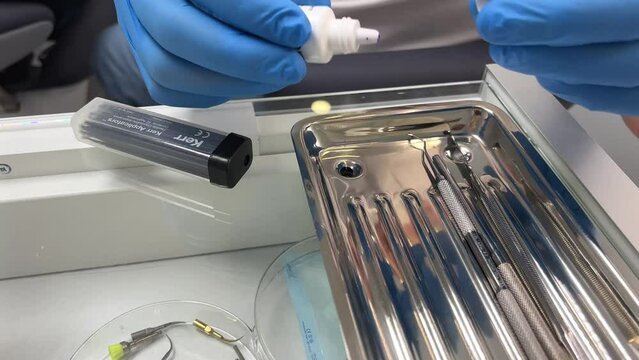 dentistry a special liquid for staining teeth before cleaning the blue color of the liquid allows you to highlight plaque that can be removed with special sandblasting tools a car for cleaning teeth