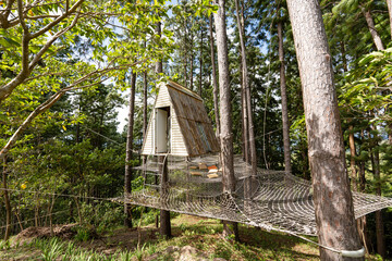 a hanging house on a web net inside the forest at Masungi Georeserve 