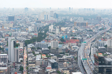 Fototapeta premium Amazing panorama view of Bangkok city skyline with blue sky. Beautiful skyscraper bangkok midtown landscape. Capital building background modern office district.