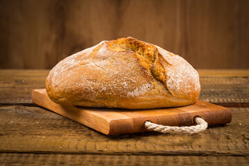 white bread over wooden background