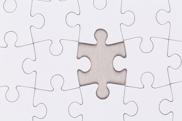 white puzzle jigsaw close up