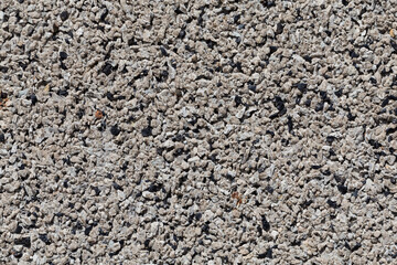 Crushed granite stones wall - close up