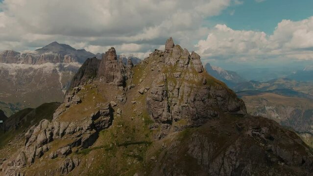 Summer in the Mountains, Vacation and Holiday in the Alps. Aerial with beautiful steep Mountains of the Dolomites. Aerial Mountain. Outdoor adventure. Cinematic color grade