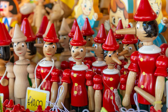 Wooden figurines depicting the character of Pinocchio in Collodi, Italy 