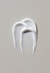 cosmetic smears of creamy texture on a pastel background