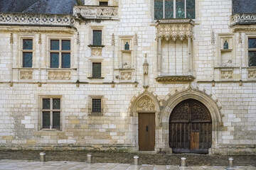 Bourges, medieval city in France, the Jacques Coeur mansion, beautiful wooden door

