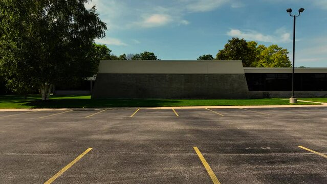 Sideways motion away from the concrete mini structure.