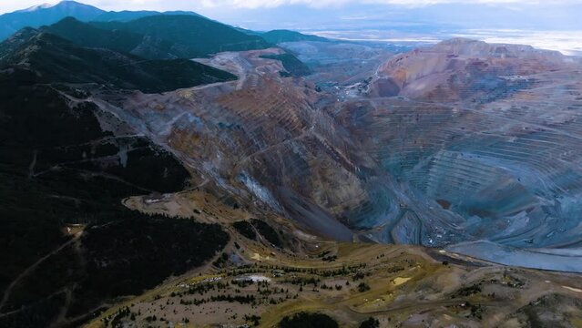 Bingham Copper Mine - pullback aerial view at dusk