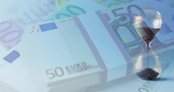 Animation of euro currency banknotes over hourglass