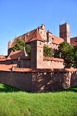 Fototapeta na wymiar Zamek Krzyżacki w Malborku, największy na świecie, Polska, gotycki, ceglany,