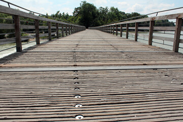 wooden bridge over the river 