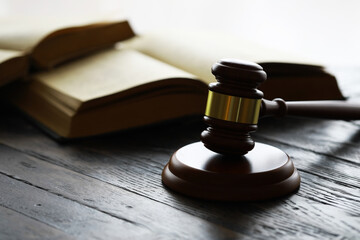 Judges gavel on wooden desk. Law firm concept.