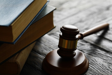 Judges gavel on wooden desk. Law firm concept.