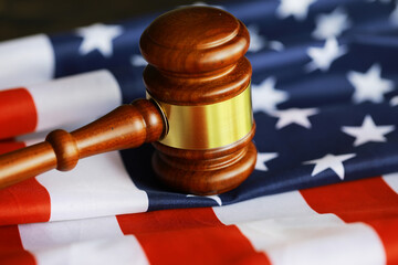 Judge's gavel on the table in focus. Cropped view of Judge's hammer for attention and verdict,...