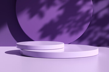 Two glossy round podiums on table counter with natural light and leaf shadows on the wall.