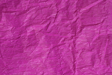 Fototapeta premium Background in an intense shade of pink. Paper, textured. Creased slightly satin surface, grunge.