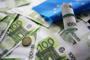 100 euro banknote pack and wood bankground. Currency, financial