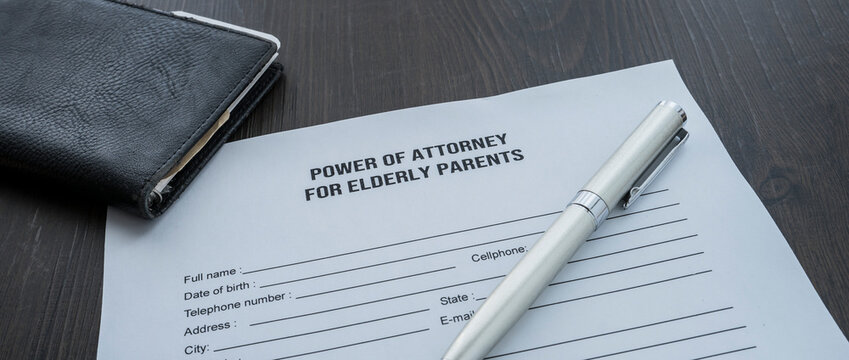 A power of attorney for elderly parents form on the desk
