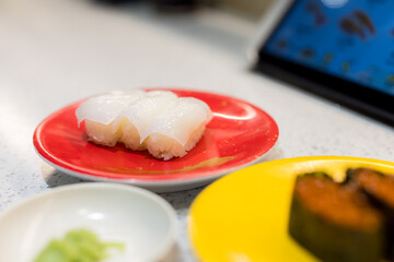 Sushi plate dish in sushi belt shop