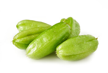 green bilimbi kamias fruit isolated on white background. pile of green bilimbi kamias fruit isolated. heap of green bilimbi kamias fruit isolated 