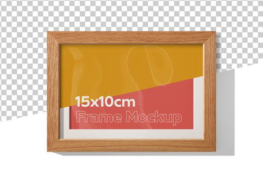 Mockup of horizontal oak wood frame 10 x 15 cm with customizable background, mount and shadows