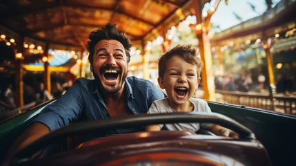 Zelfklevend Fotobehang Grandfather and grandson smile and have fun while driving a bumper car in an amusement park. © sirisakboakaew