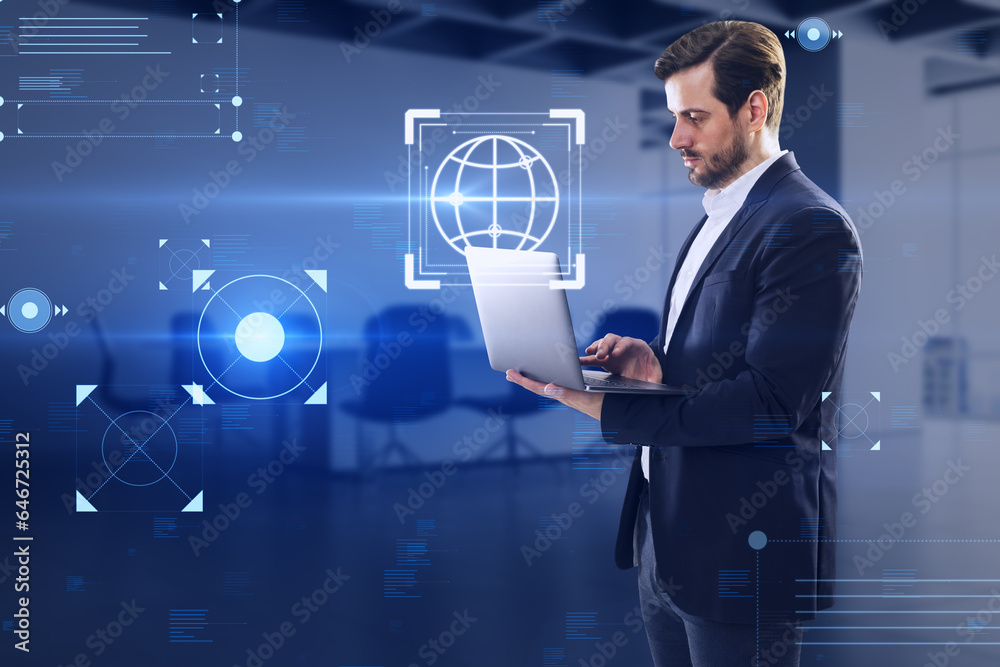 Aufkleber young european businessman using laptop with creative hacking interface on blurry office interior ba