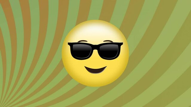 Animation of sunglasses face emoji against green radial rays in seamless pattern on grey background