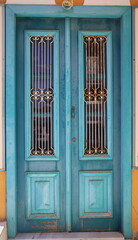 Beautiful wooden blue old door on Symi island in Greece