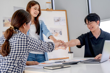 Architect design works drawing sketches, plans, blueprints and building architectural construction models in an architect studio.