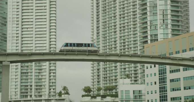 Metro monorail in Miami follow pan across