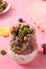 Cereal breakfast, healthy food, mixed with milk and fruits and nuts, vitamins and protein