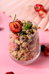 Cereal breakfast, healthy food, mixed with milk and fruits and nuts, vitamins and protein